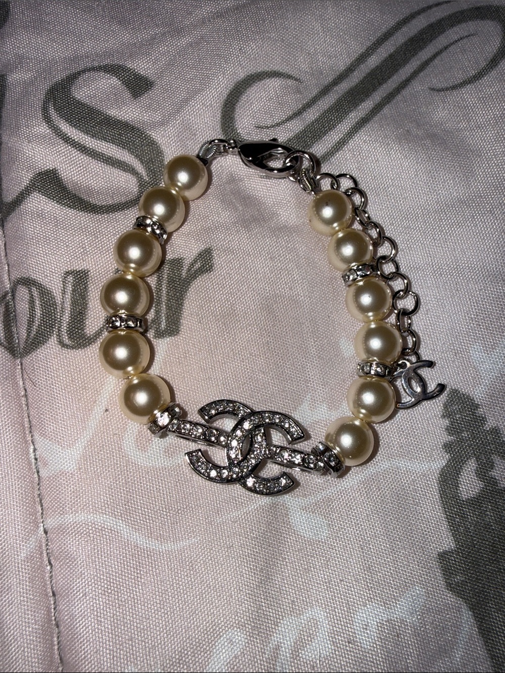 Pearl Cc purse charm.